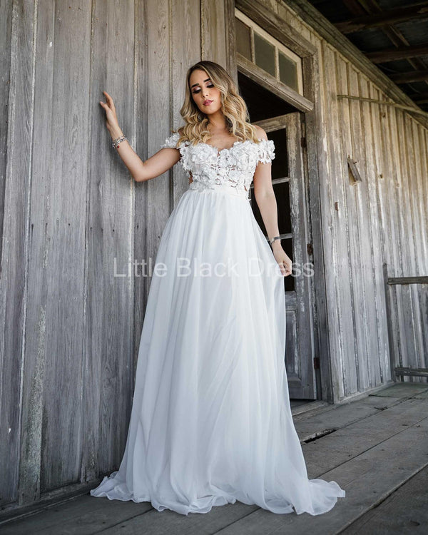 Vestido de novia con bordado en top